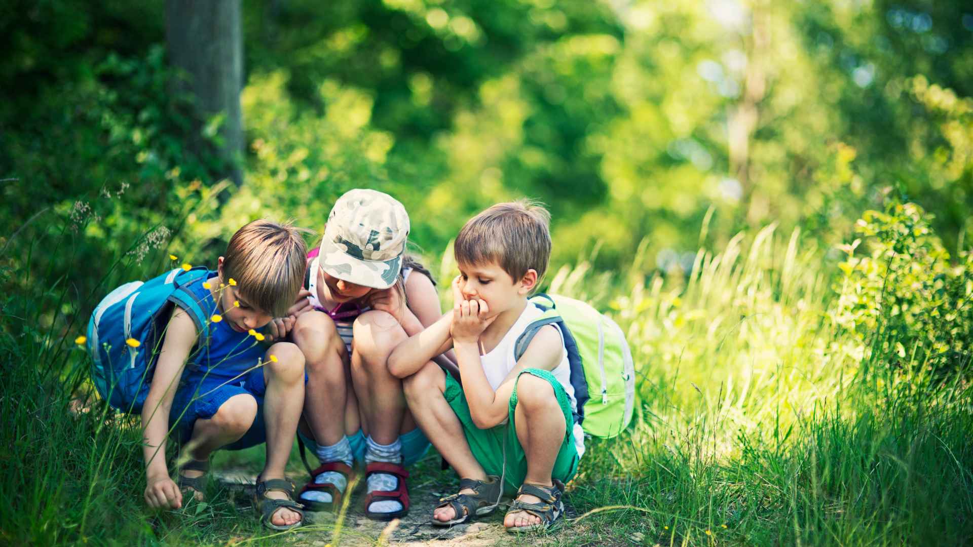 Family enjoying a spring nature walk together, one of the best Easter activities for kids