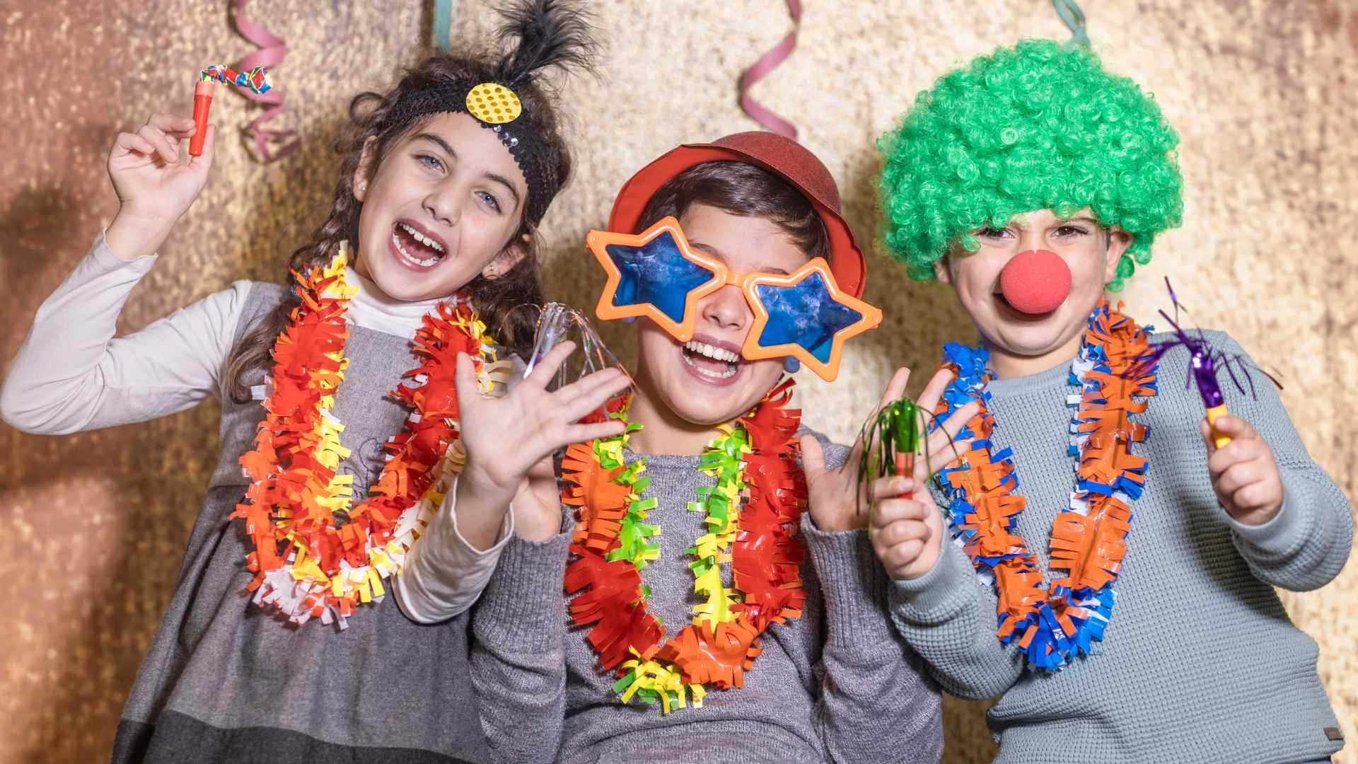 Teens working together on a DIY escape room style puzzle at a birthday party