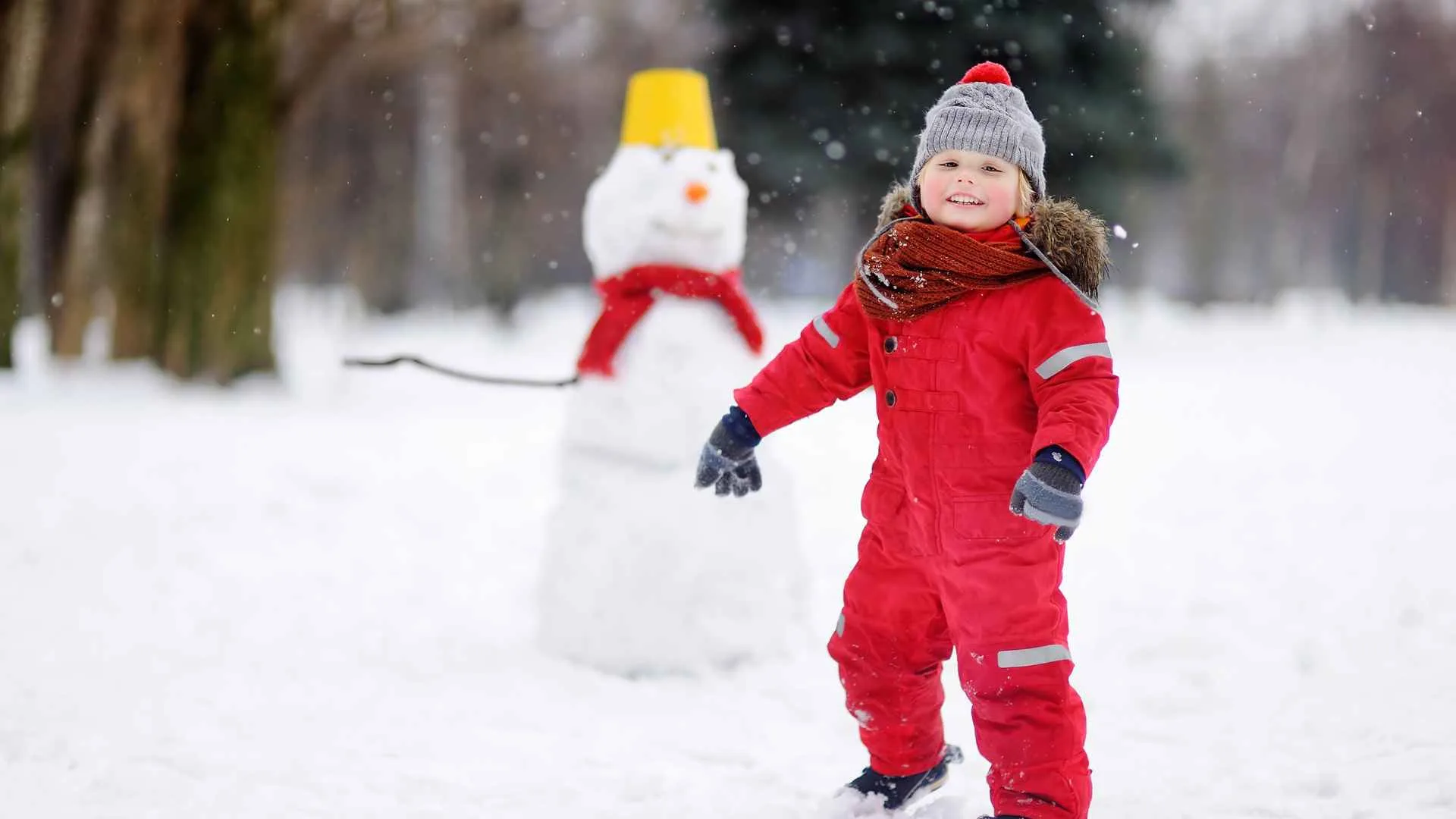 Parent and child doing a hands-on outdoor activity together