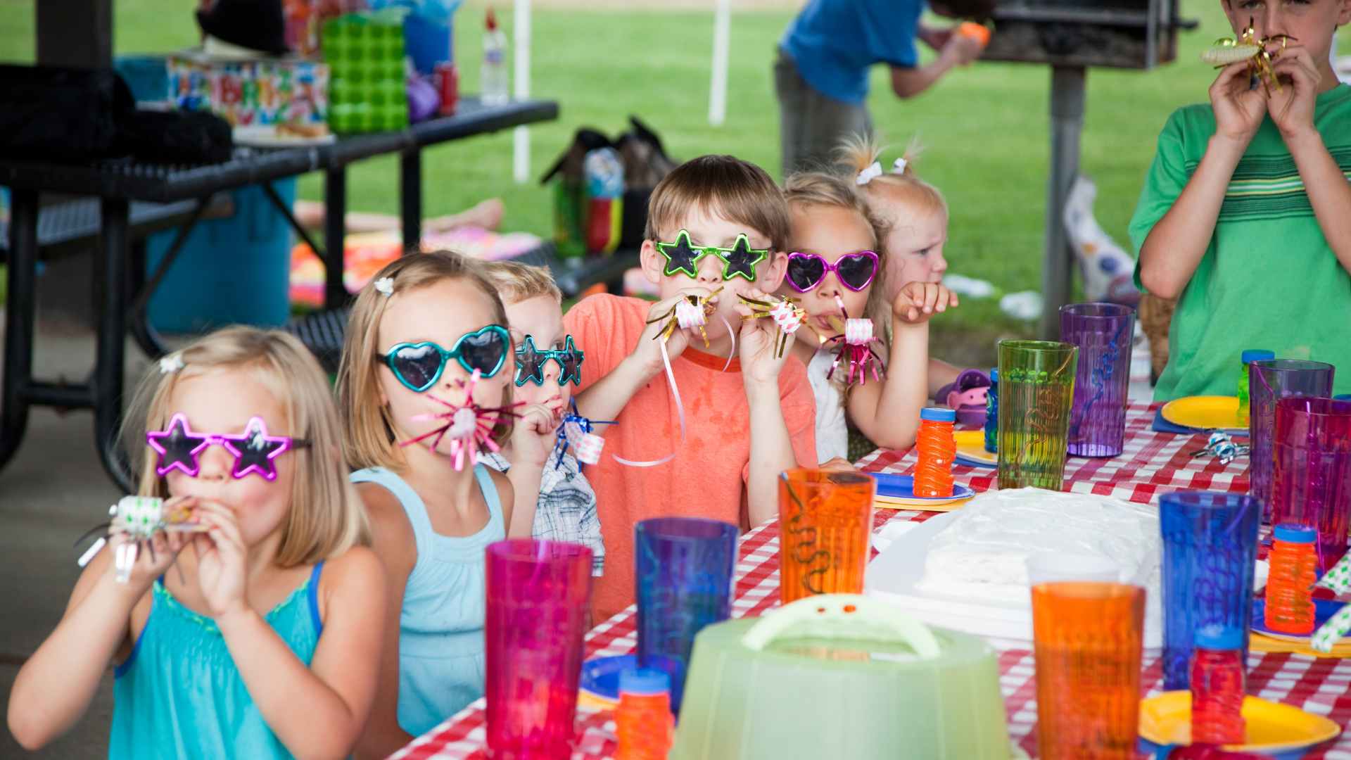Group of twelve-year-olds laughing together at a screen-free birthday party